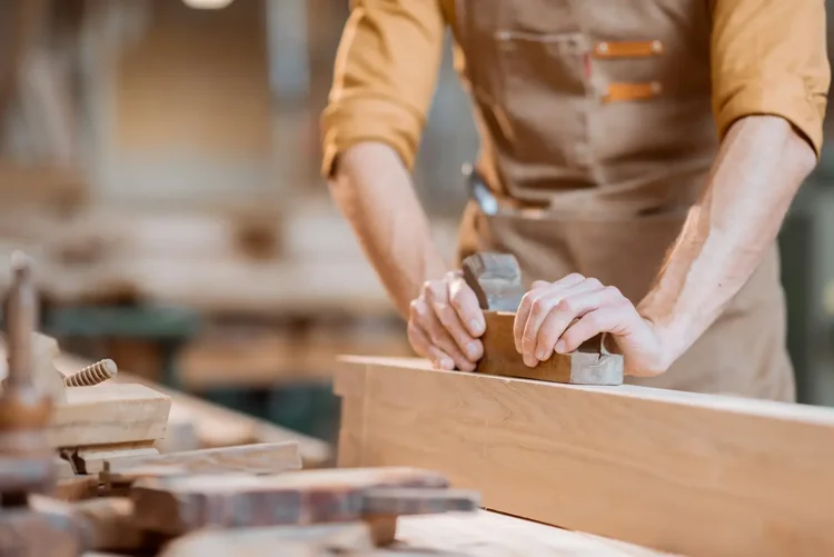 Men's Shed member working on a woodworking project at the Mossman workshop
