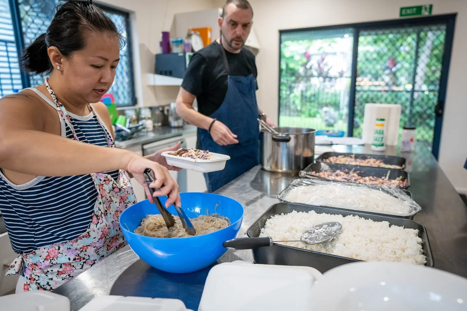 Volunteers whipping up a storm in the community kitchen