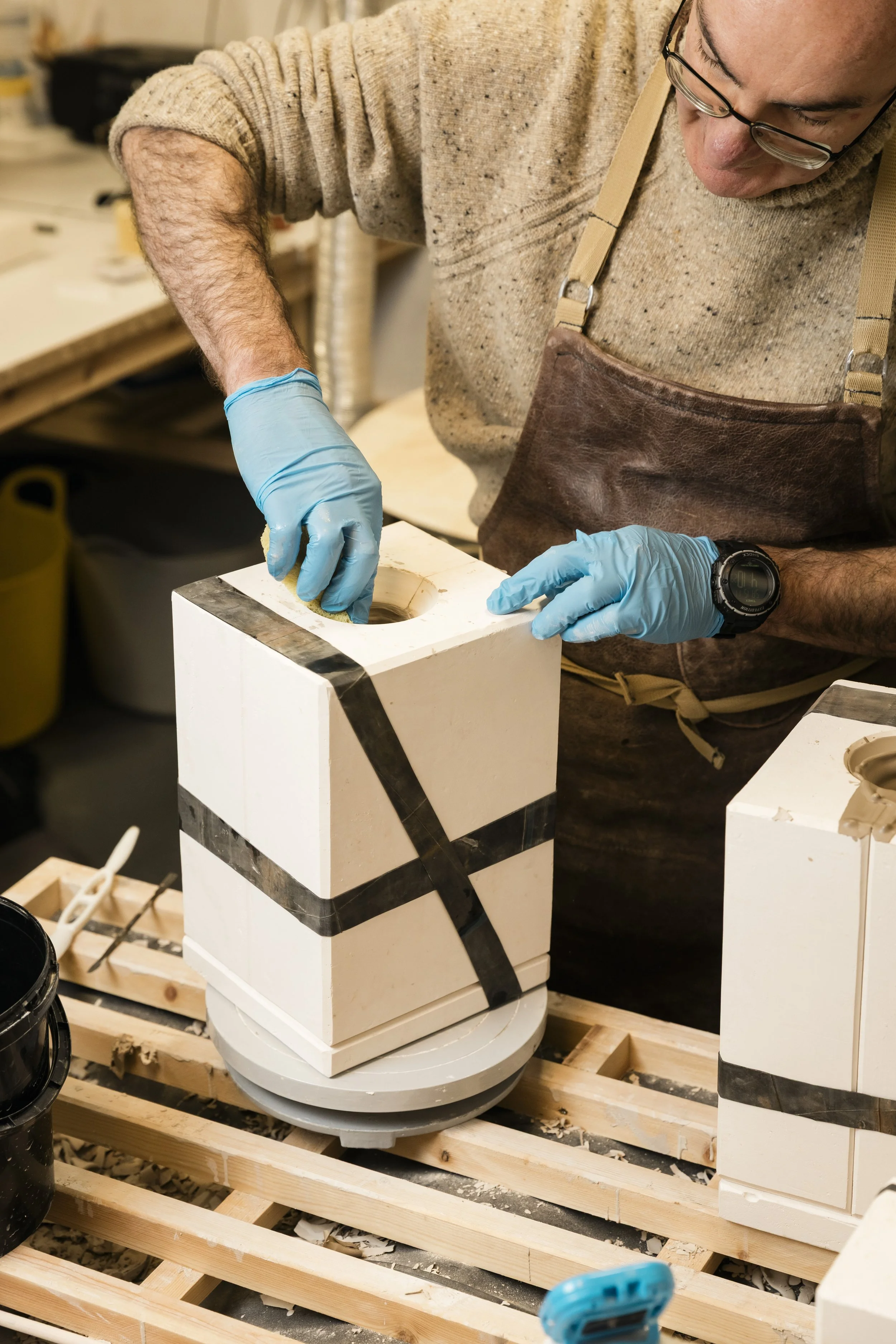 	
Scottish ceramicist, Arra Fletcher, working on a mould in his studio.