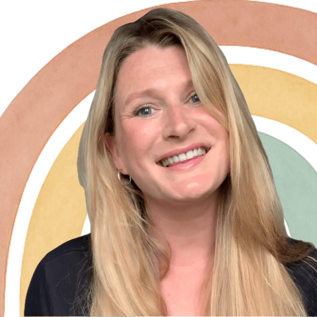 A smiling woman with long blonde hair, blue eyes, and wearing a black top, in front of a colorful rainbow background.