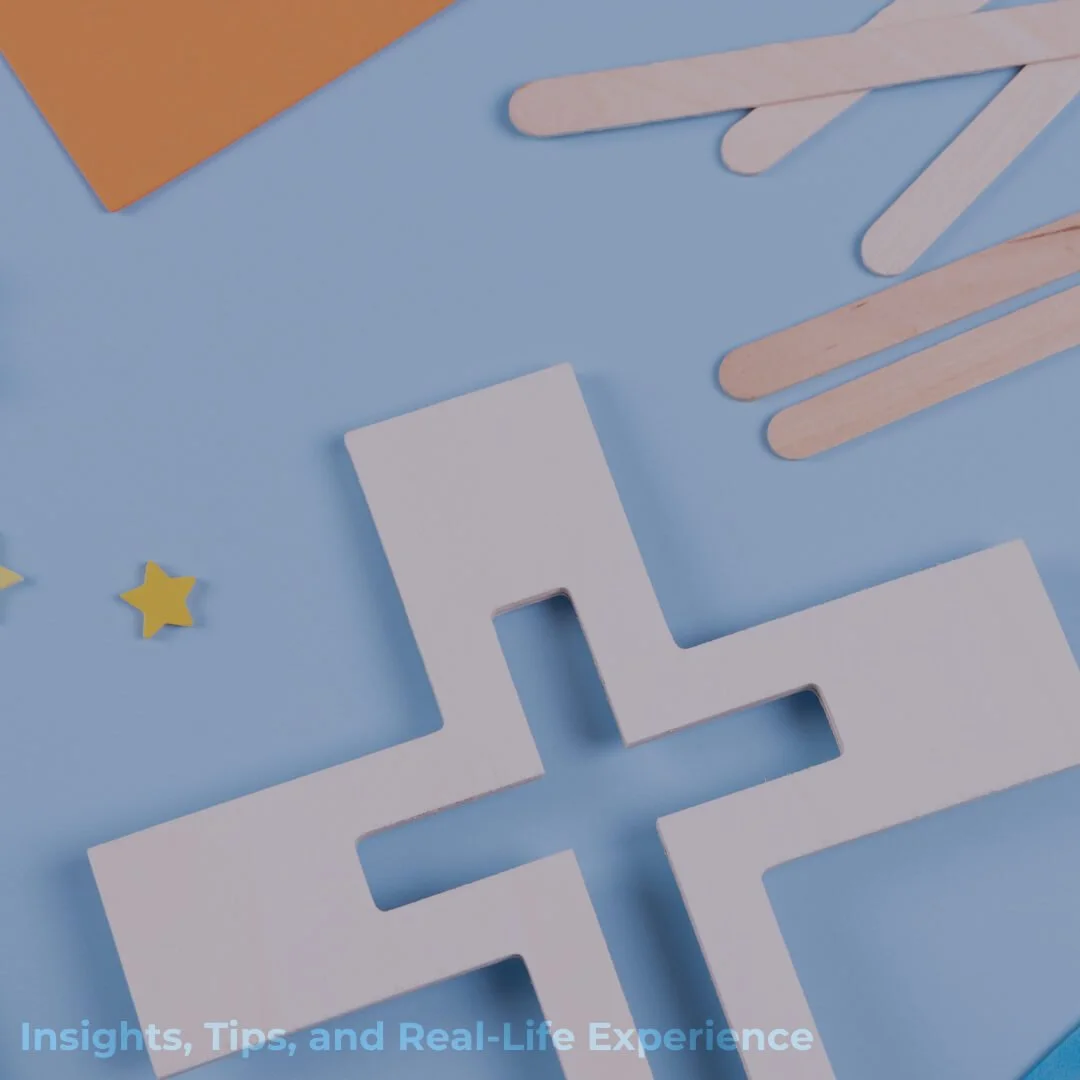 Group of six women standing together, smiling and laughing, dressed in colorful and light-colored summer outfits against a plain white background.