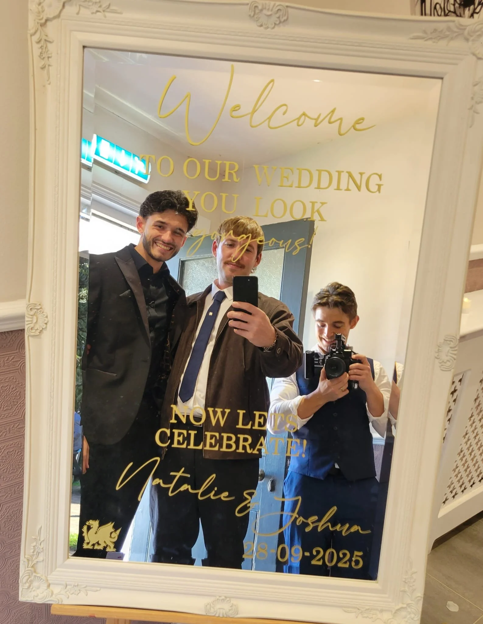 A photo from a wedding videographers day capturing in a mirror happy and relaxed