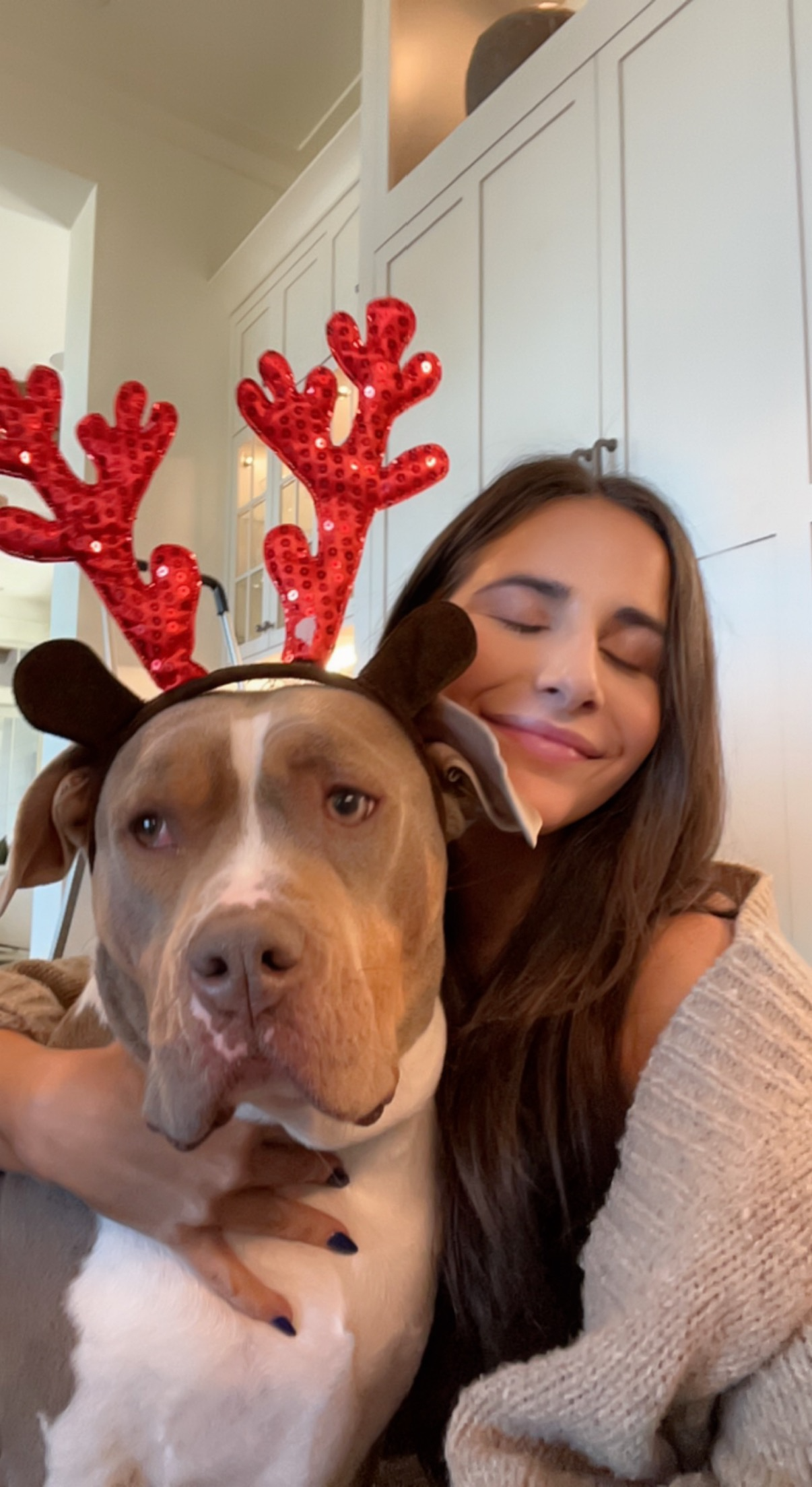 MEG WITH MOOSE AND ANTLERS.png