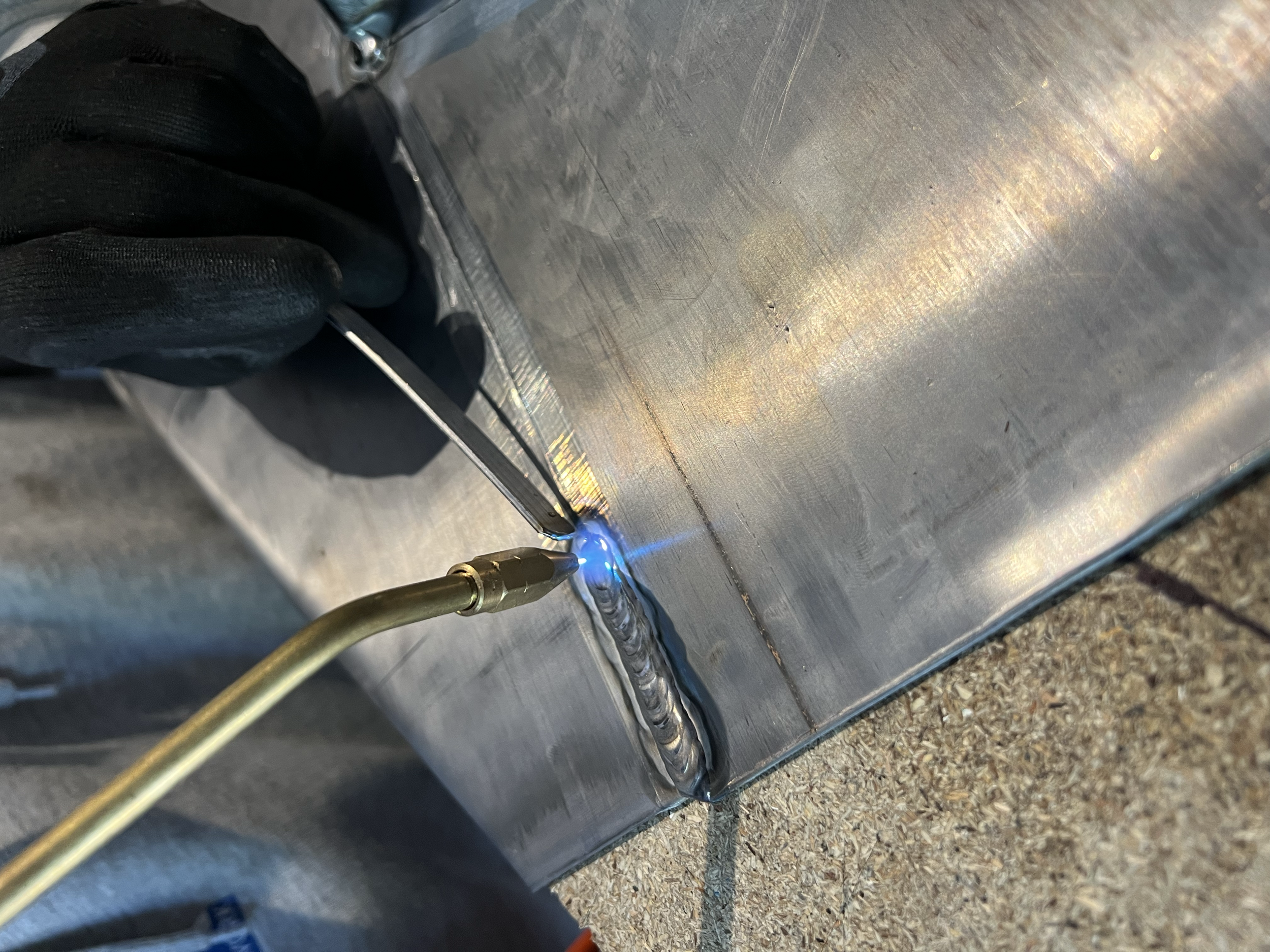 Leadwork specialist welding and fabricating a lead dormer by Apex Roofing & Leadwork in Bridport