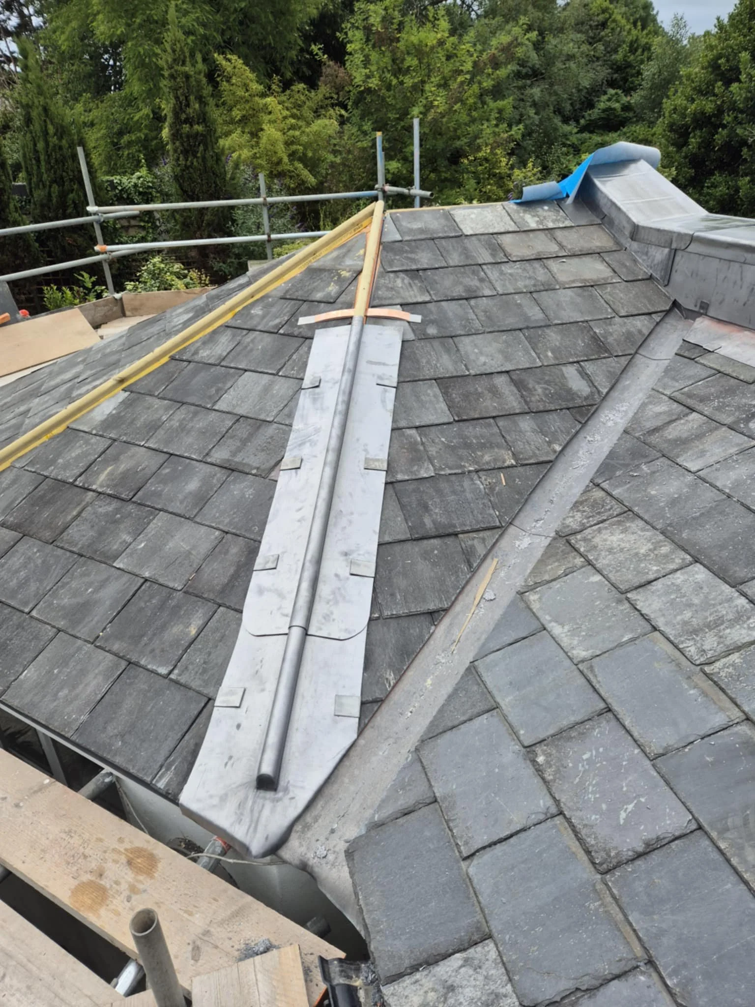 Lead valley installation on a slate roof in Axminster