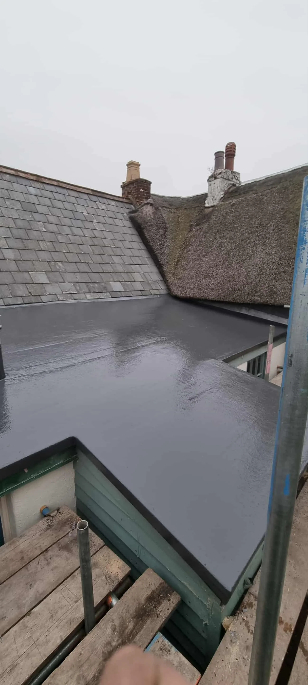 GRP fibreglass flat roof installed on home extension by Apex Roofing & Leadwork, Dorset