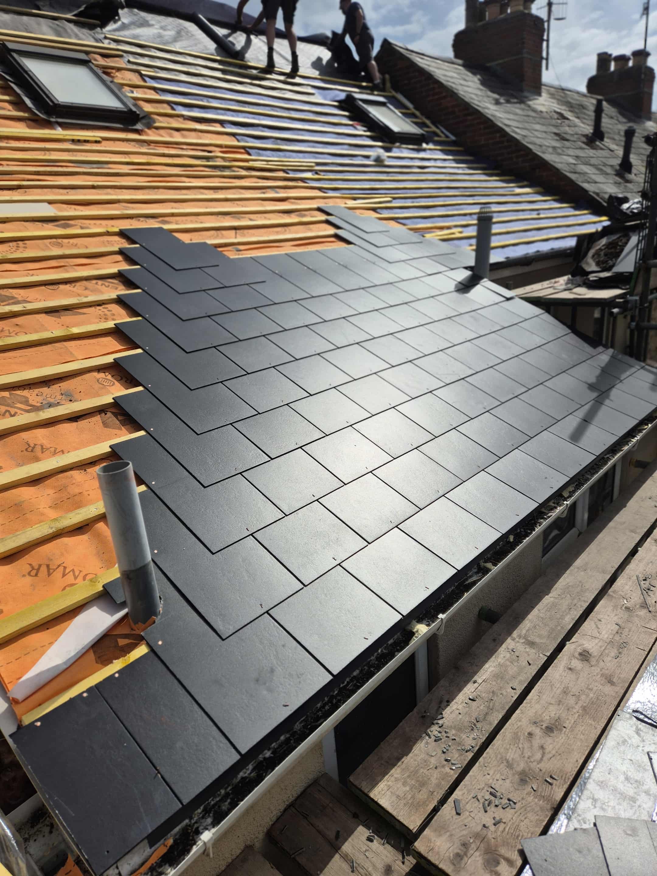 Full slate re-roof and window installation in Axminster 