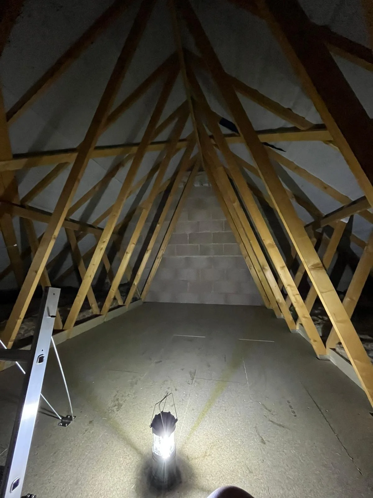 Loft boarding installation for extra storage in Devon home