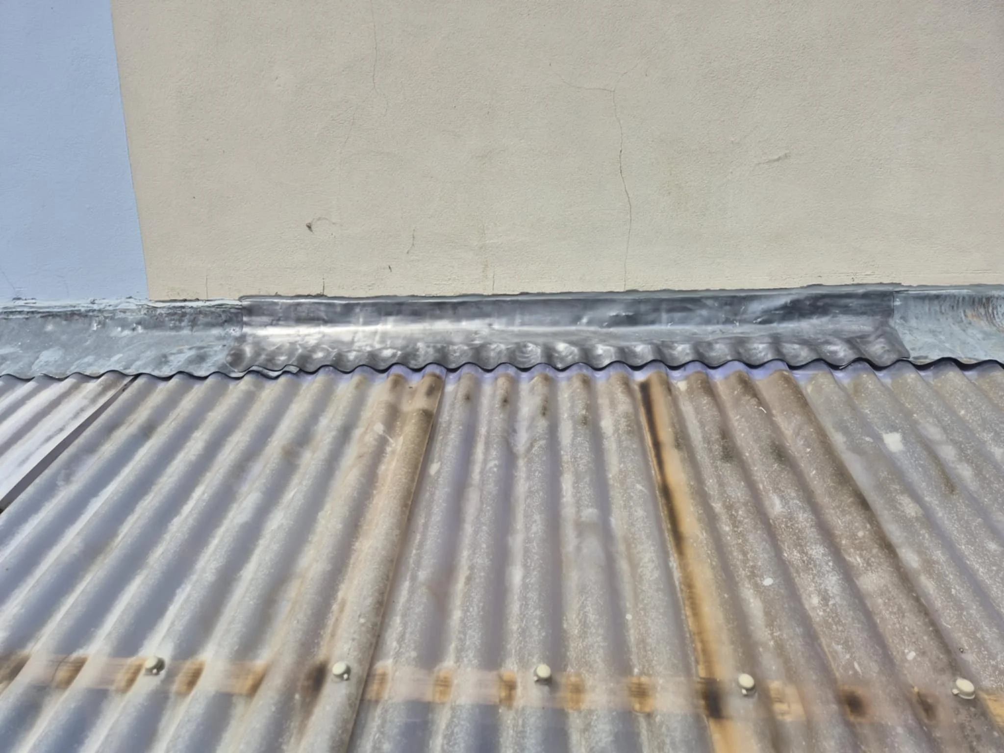 Bespoke lead detailing fixing damaged lead on a property in Axminster