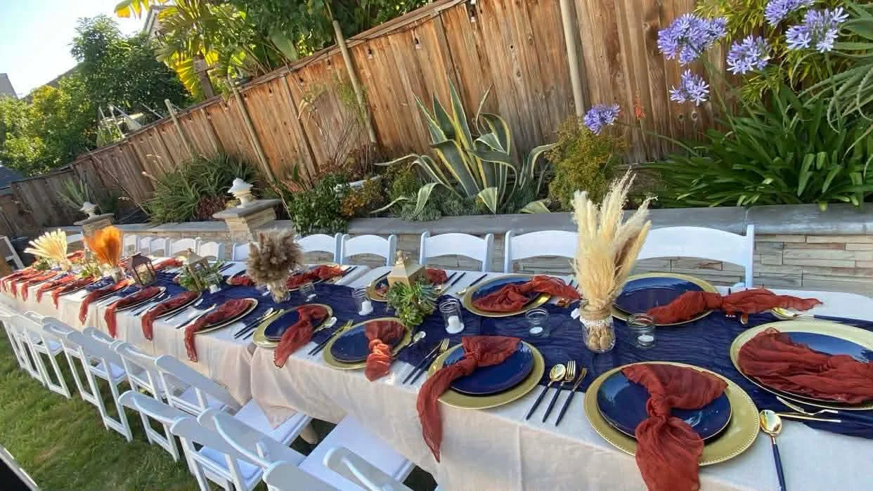 Blue and Dark Orange Outdoor Event Table Setup.jpg