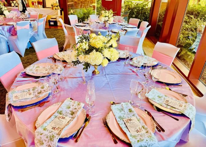 Pink themed table setup for an event
