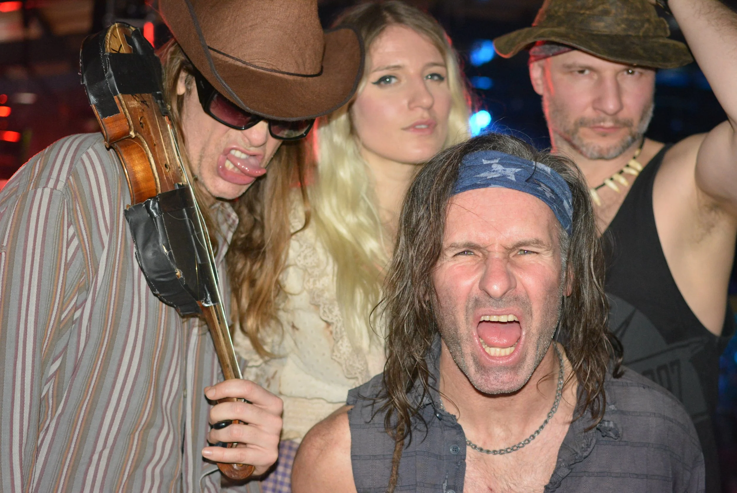 90s novelty act Rednex delivering high-energy fun at a festival event.