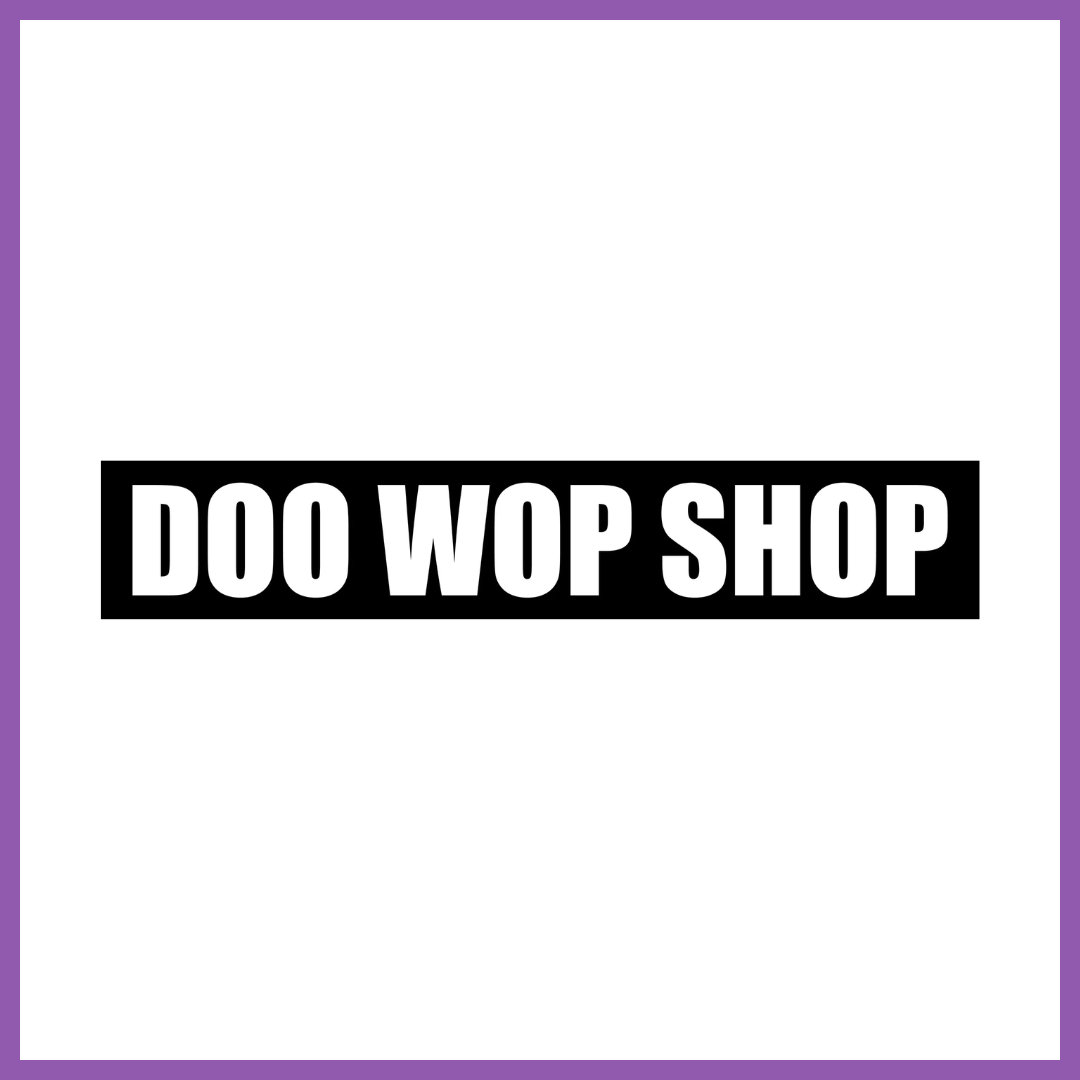 A sign with the words " DOO WOP SHOP " in bold white letters on a black background, centered on a white background with a purple border.