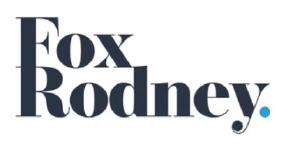 Logo with the text 'Fox Rodney' in black font, featuring a blue dot at the end.