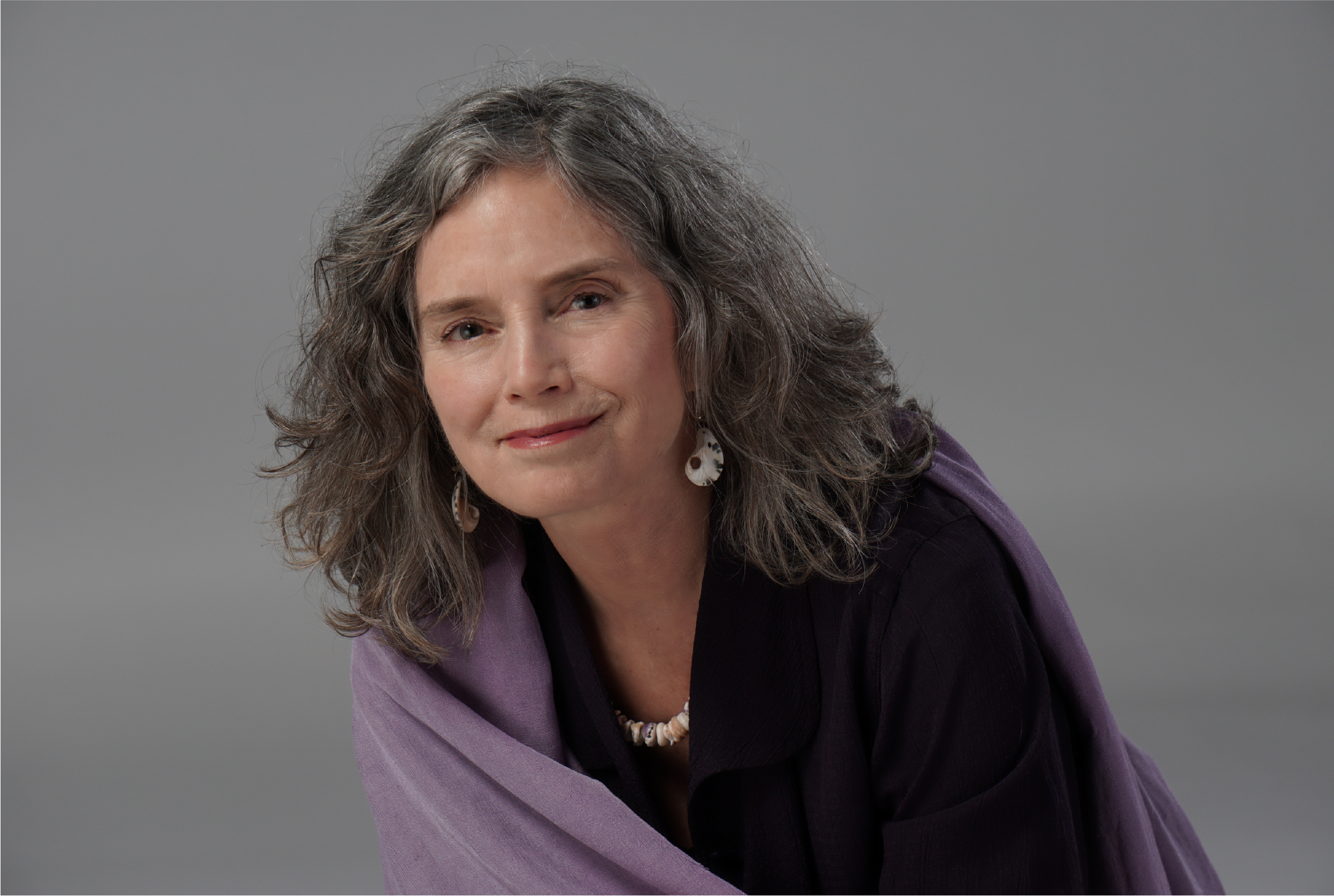 Linda Francis portrait with a gentle, calm expression, conveying compassion, emotional awareness, and wisdom