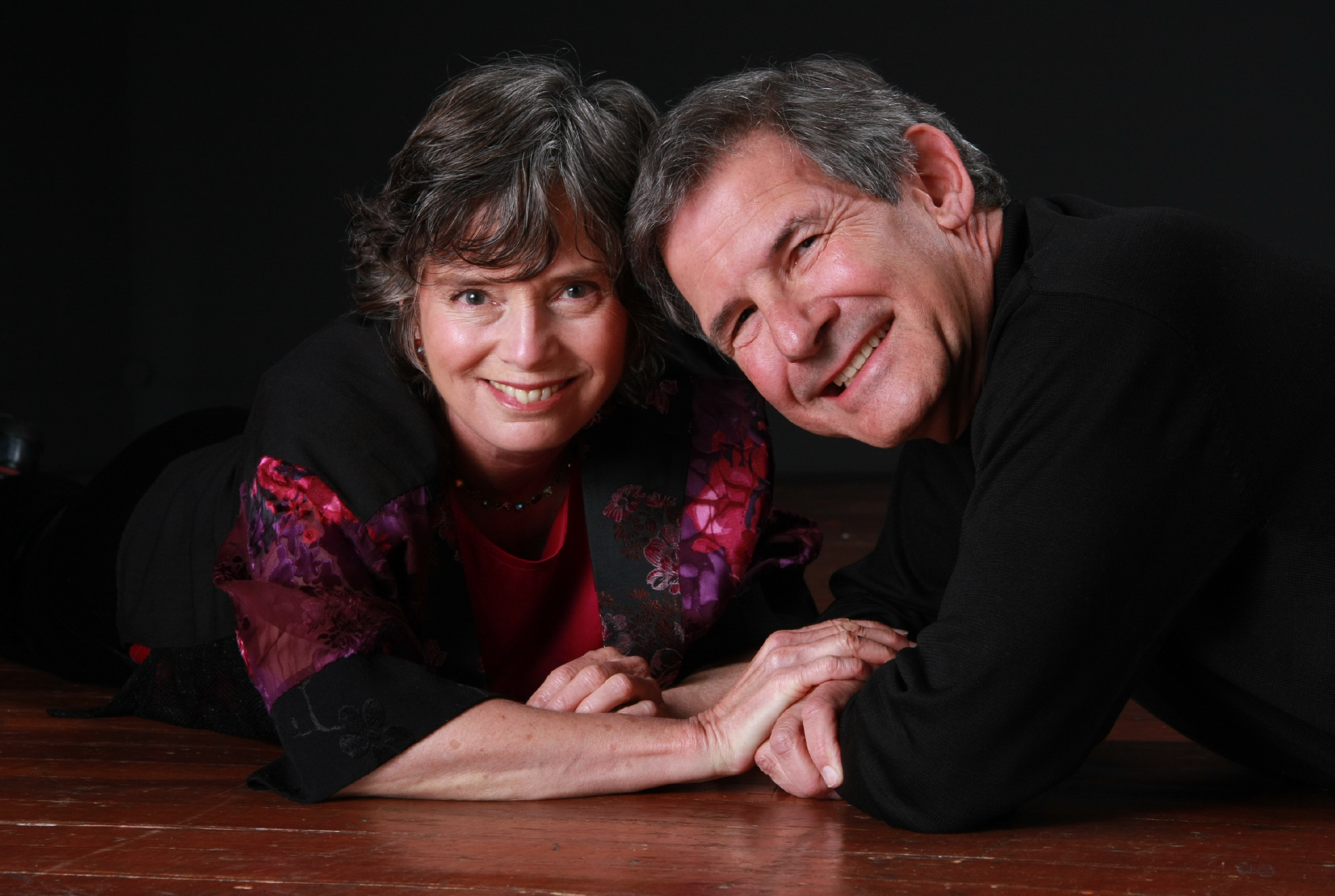Gary Zukav and Linda Francis smiling together and leaning close, expressing warmth, trust, and spiritual partnership