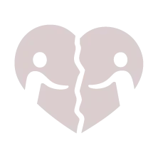 Icon of a broken heart with two figures separated, symbolizing the struggle to form genuine connection in modern relationships, addressed by Universal Human Foundation.