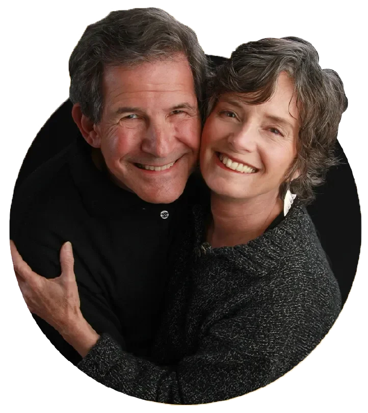 Gary Zukav and Linda Francis, founders of the Universal Human Foundation, smiling and embracing, expressing authentic connection, partnership, and shared purpose