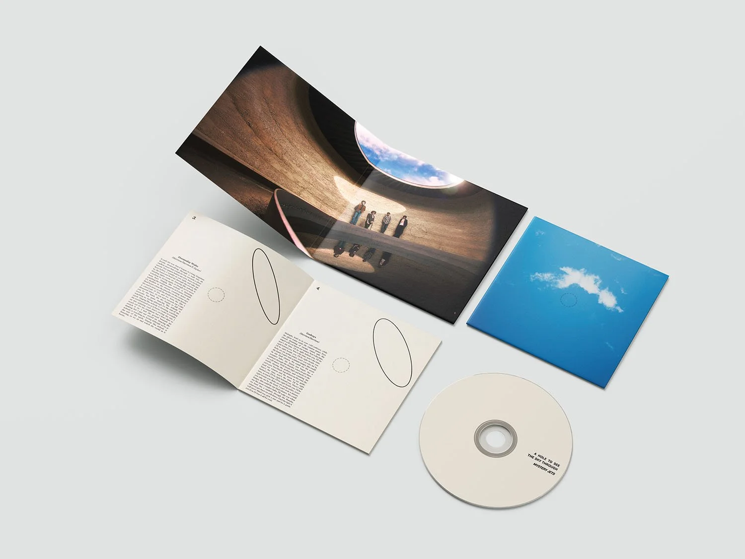 mystery jets album campaign a hole to see the sky through shot for press, vinyl record and CD new album