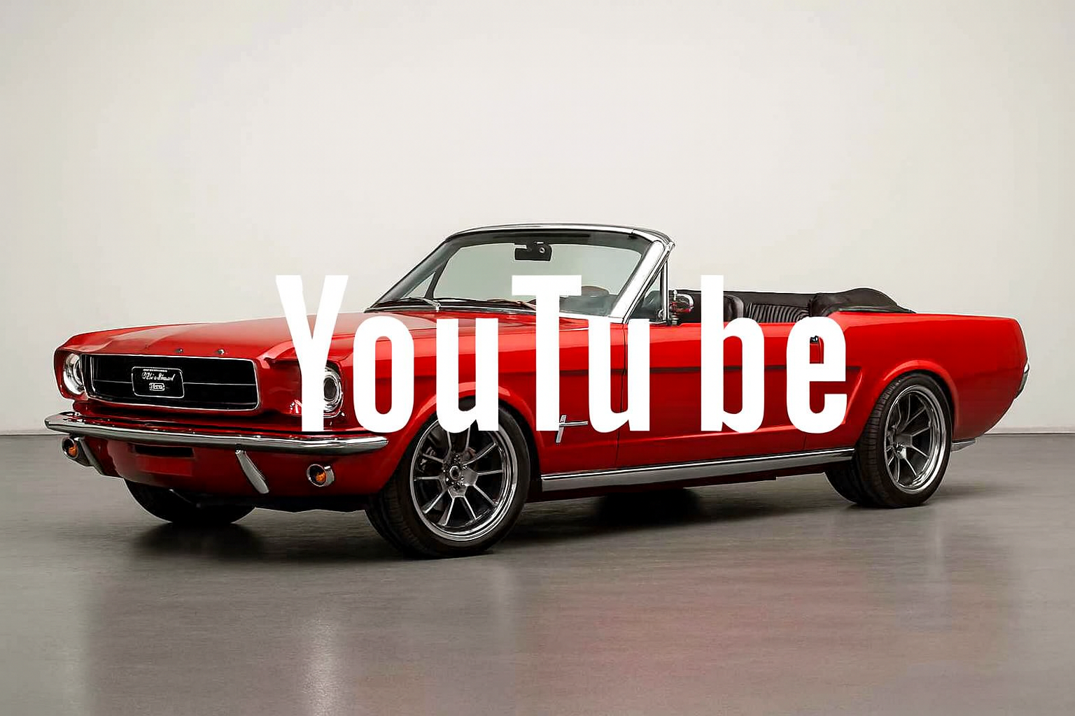Red vintage convertible car parked indoors with large YouTube logo overlay.
