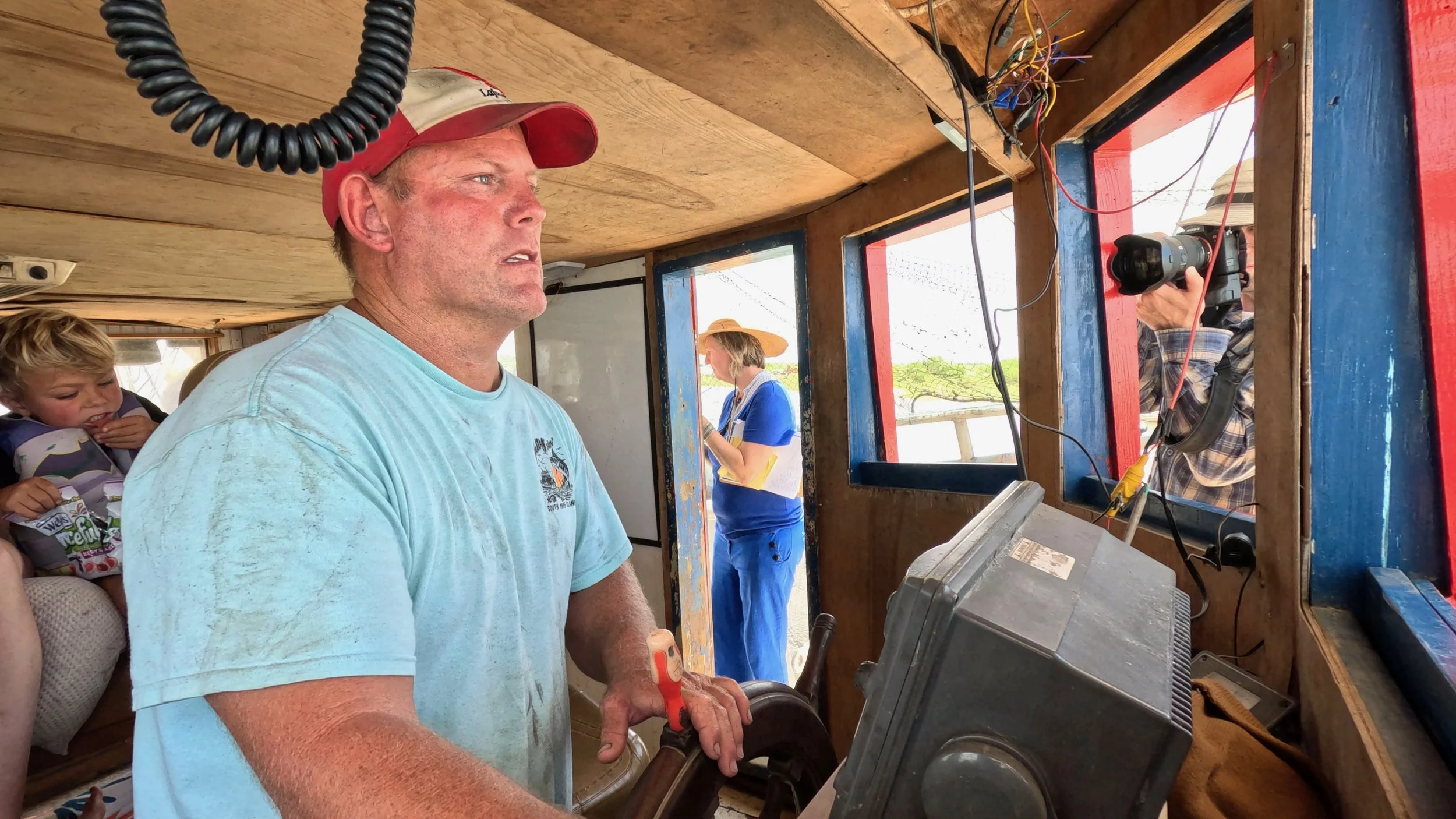 Captain Phillip Dyson Jr. taking reporters out to show the damage being done in Cameron Parish. 