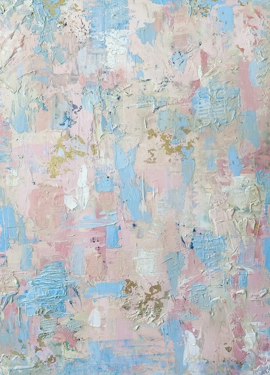 Abstract pastel-colored painting with textured layers of pink, blue, white, and gold paint.