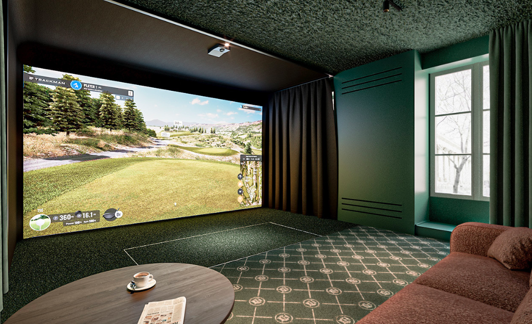espace simulateur de golf vue madeleine et coin canapé lounge