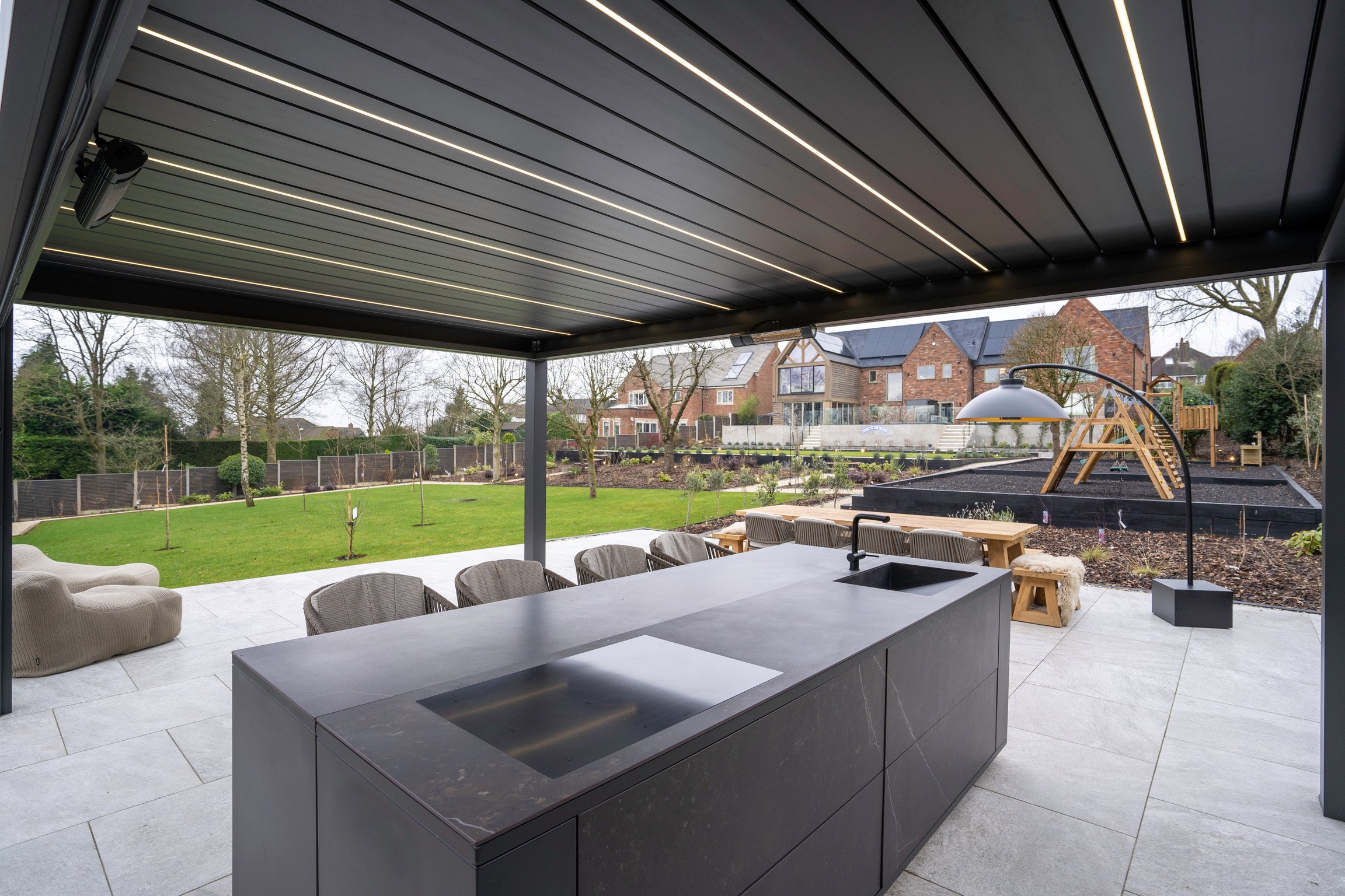 Luxury outdoor kitchen with integrated lighting, audio and WiFi coverage