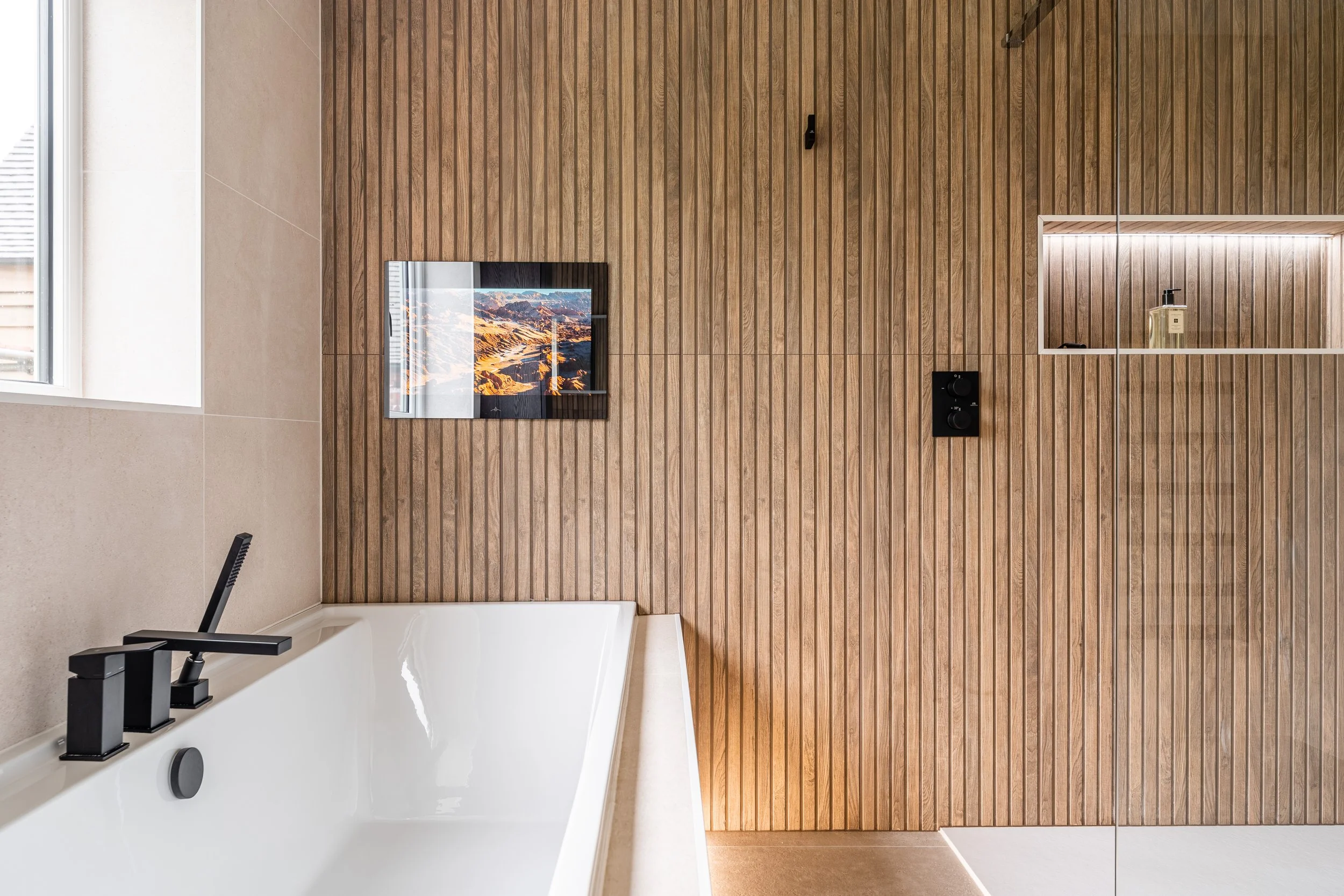 Luxury bathroom with integrated smart home lighting and automation