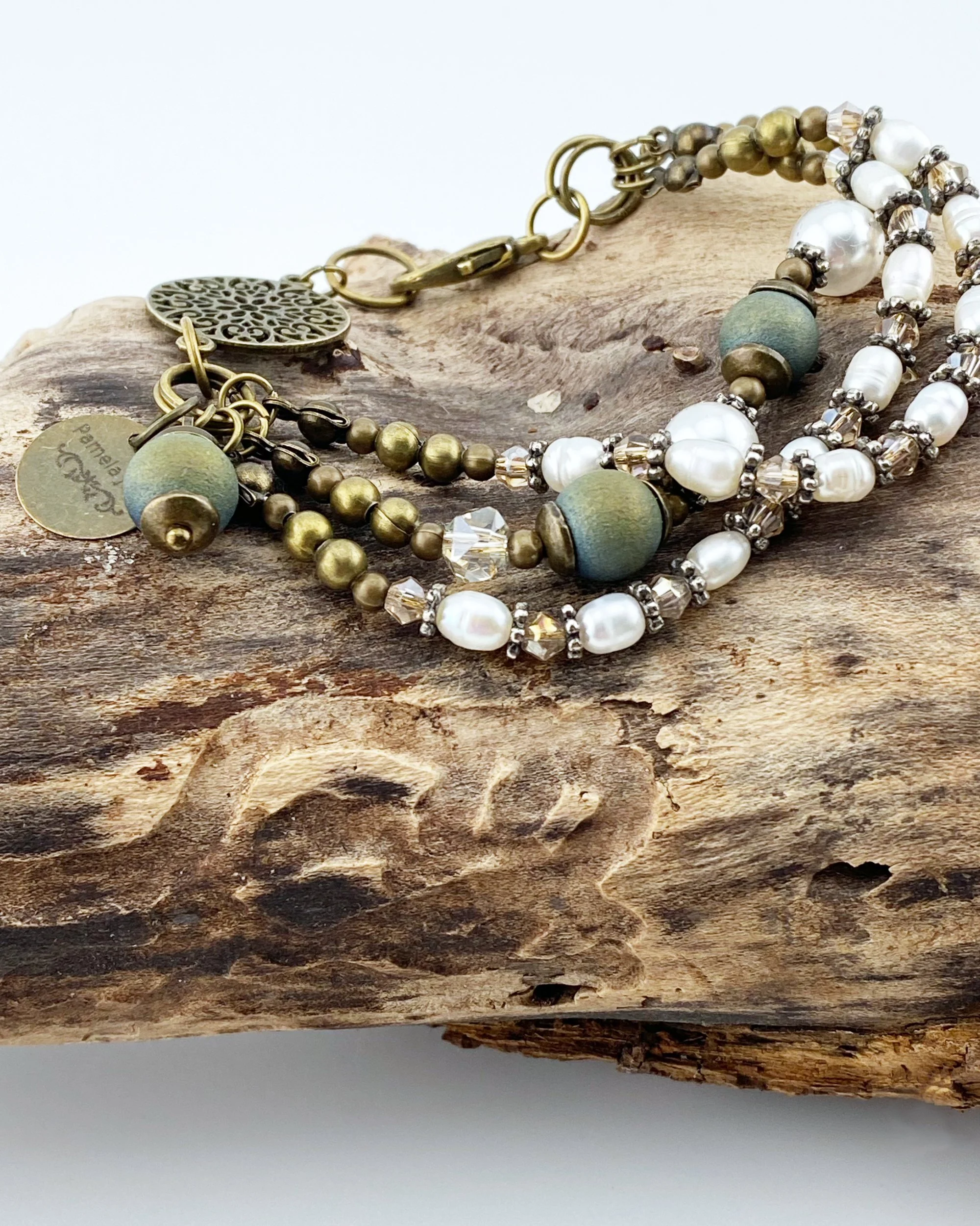 Serene Teal Pearl Harmony: Handcrafted Three-Strand Bracelet