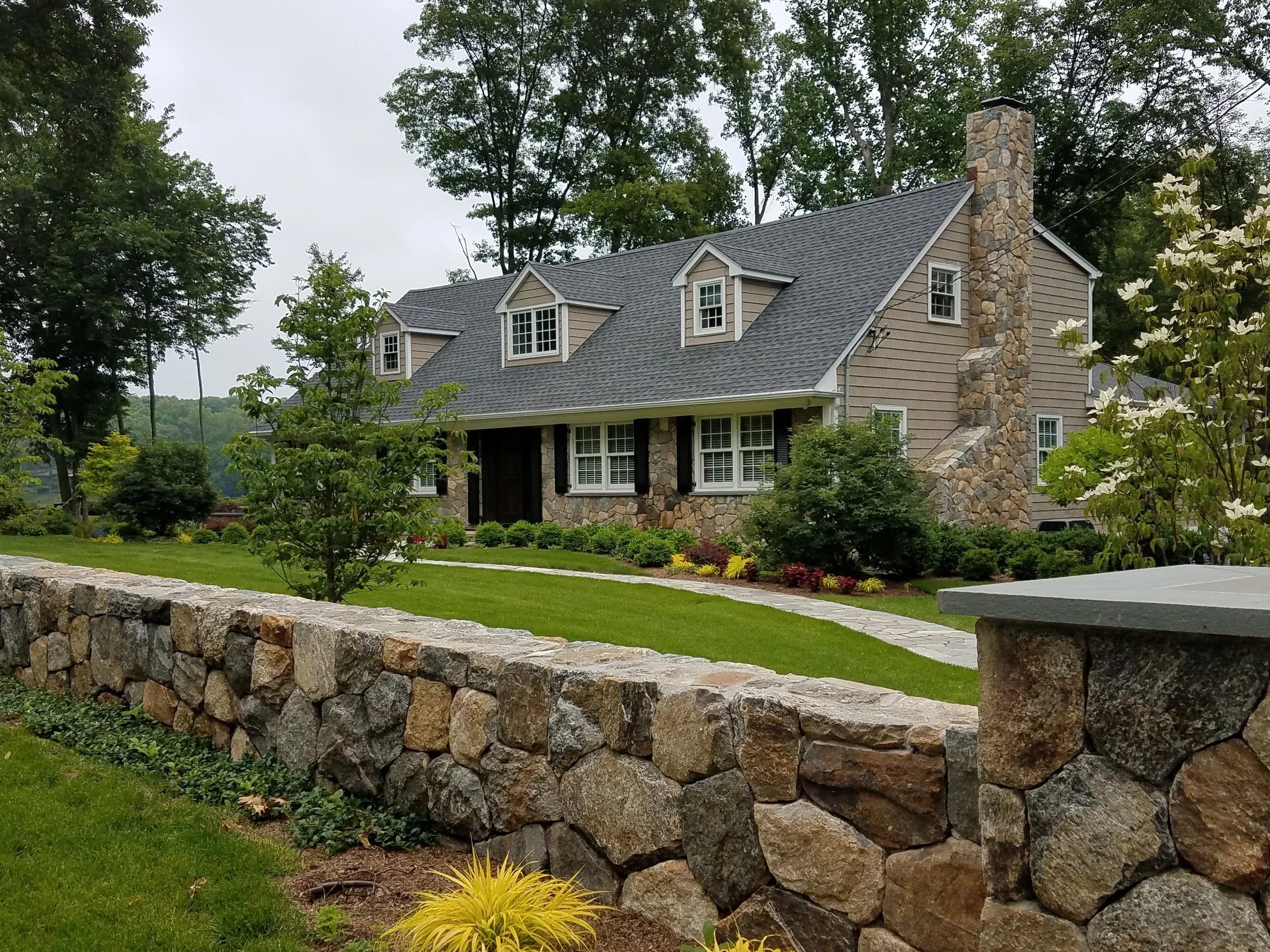 MAKEOVER WITH NEW FACADE & LANDSCAPING