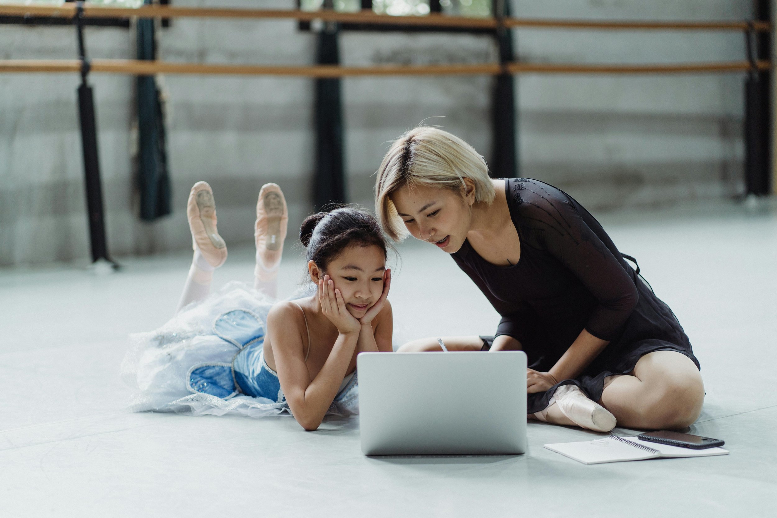 ballet student and teacher on laptop