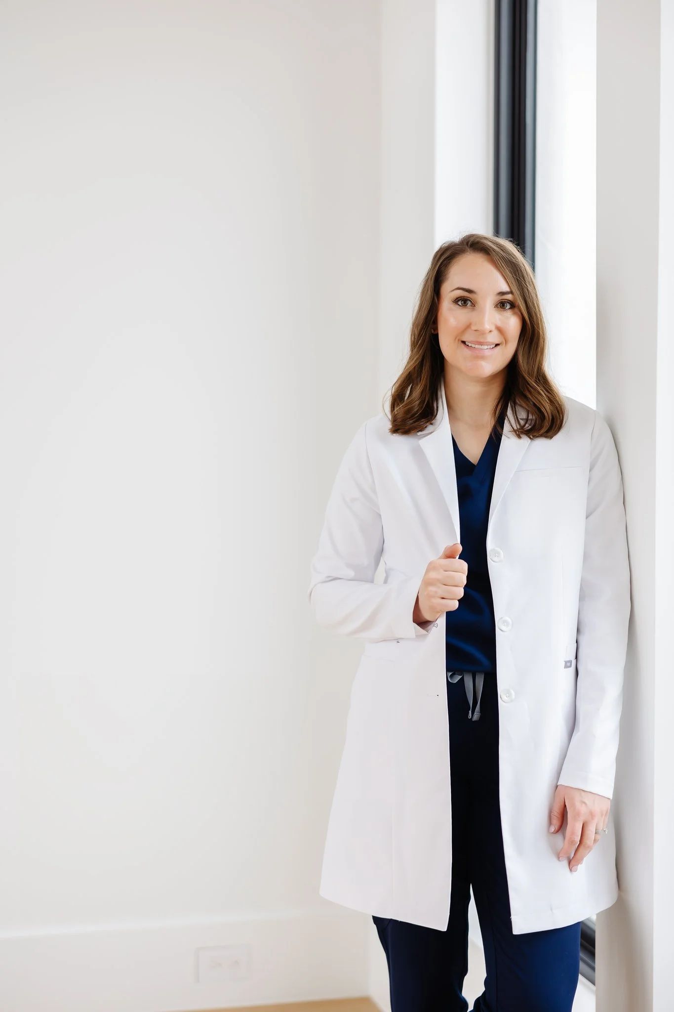 Image of Nicole Stennett in her white coat