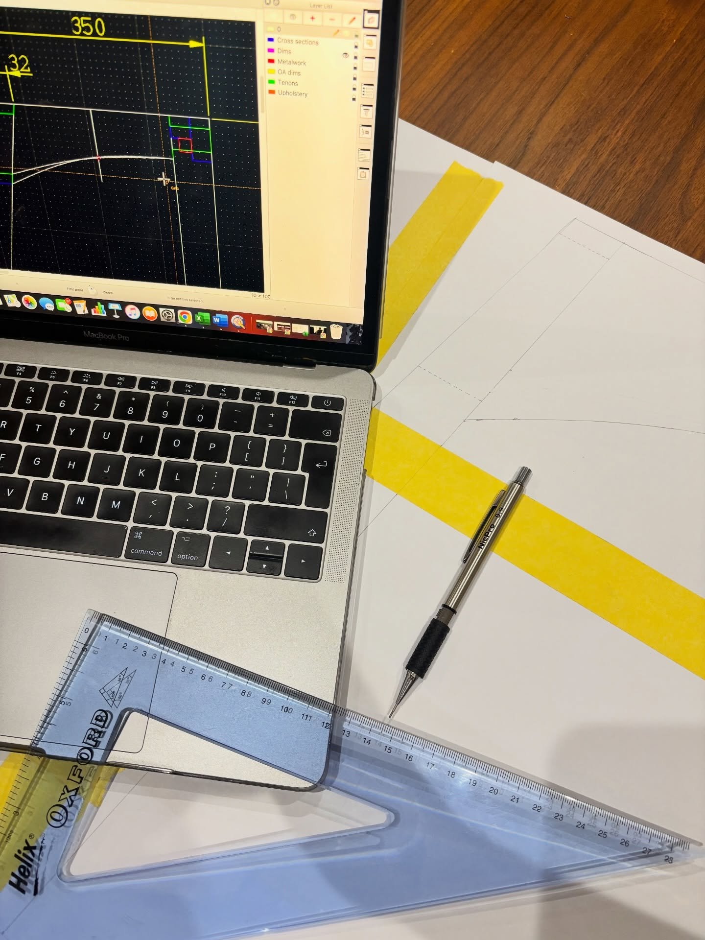 CAD drawings translated into a full scale rod - scaling the furniture design up properly before committing to the solid timber. Digital technical design meets traditional joinery, refining proportions and getting the dimensions spot on for high quali