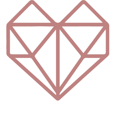 Pink heart-shaped geometric gem outline on a black background.
