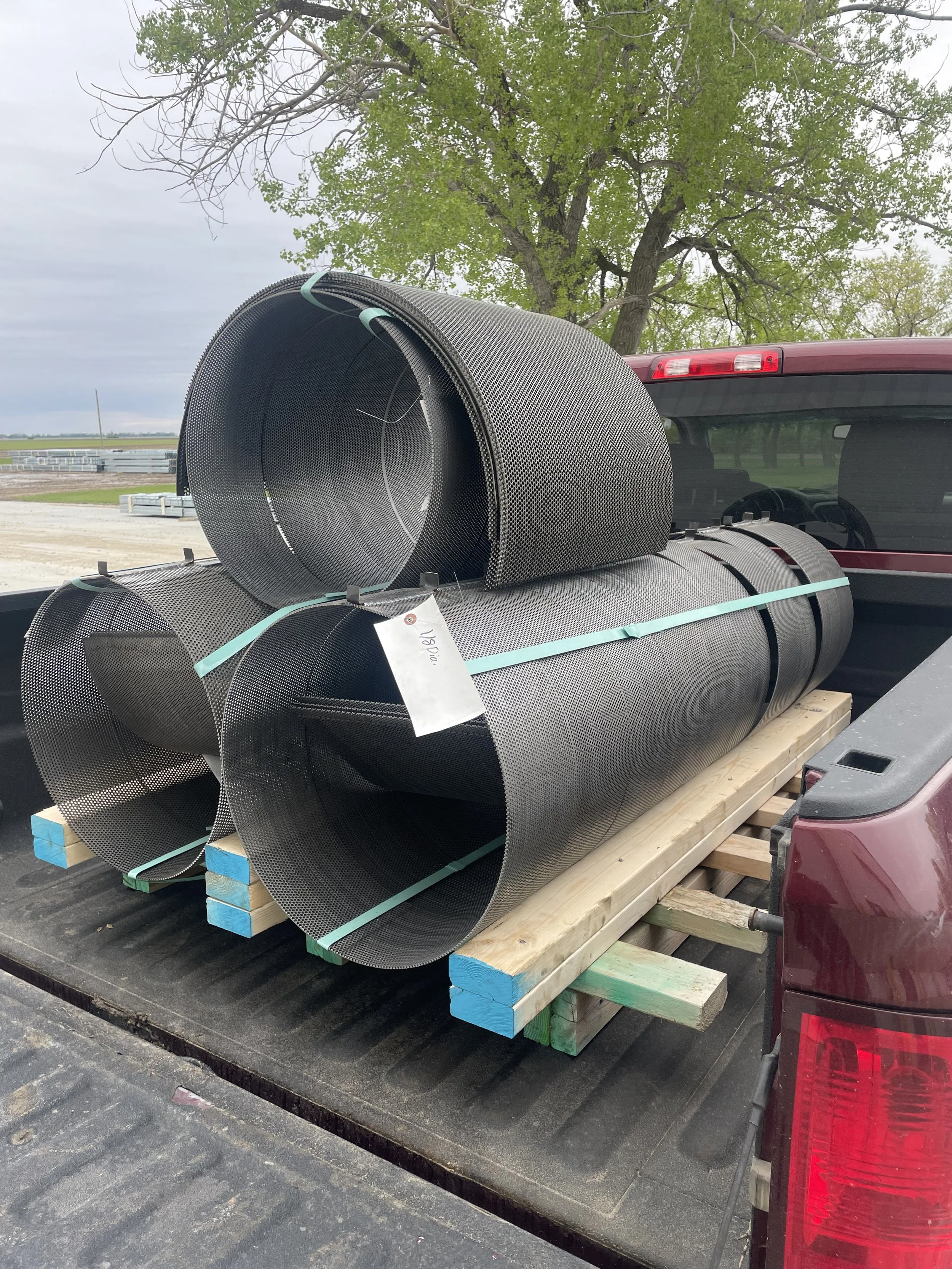 Hammer mill screens on delivery truck.