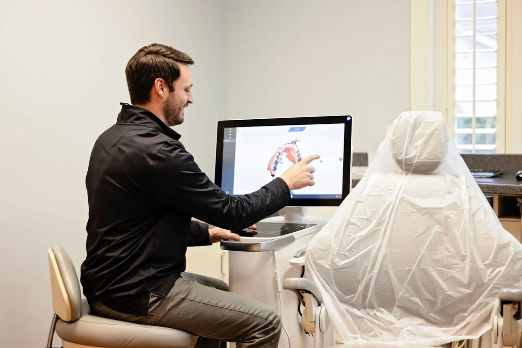 Dr. Charles Nason looking at patient imaging