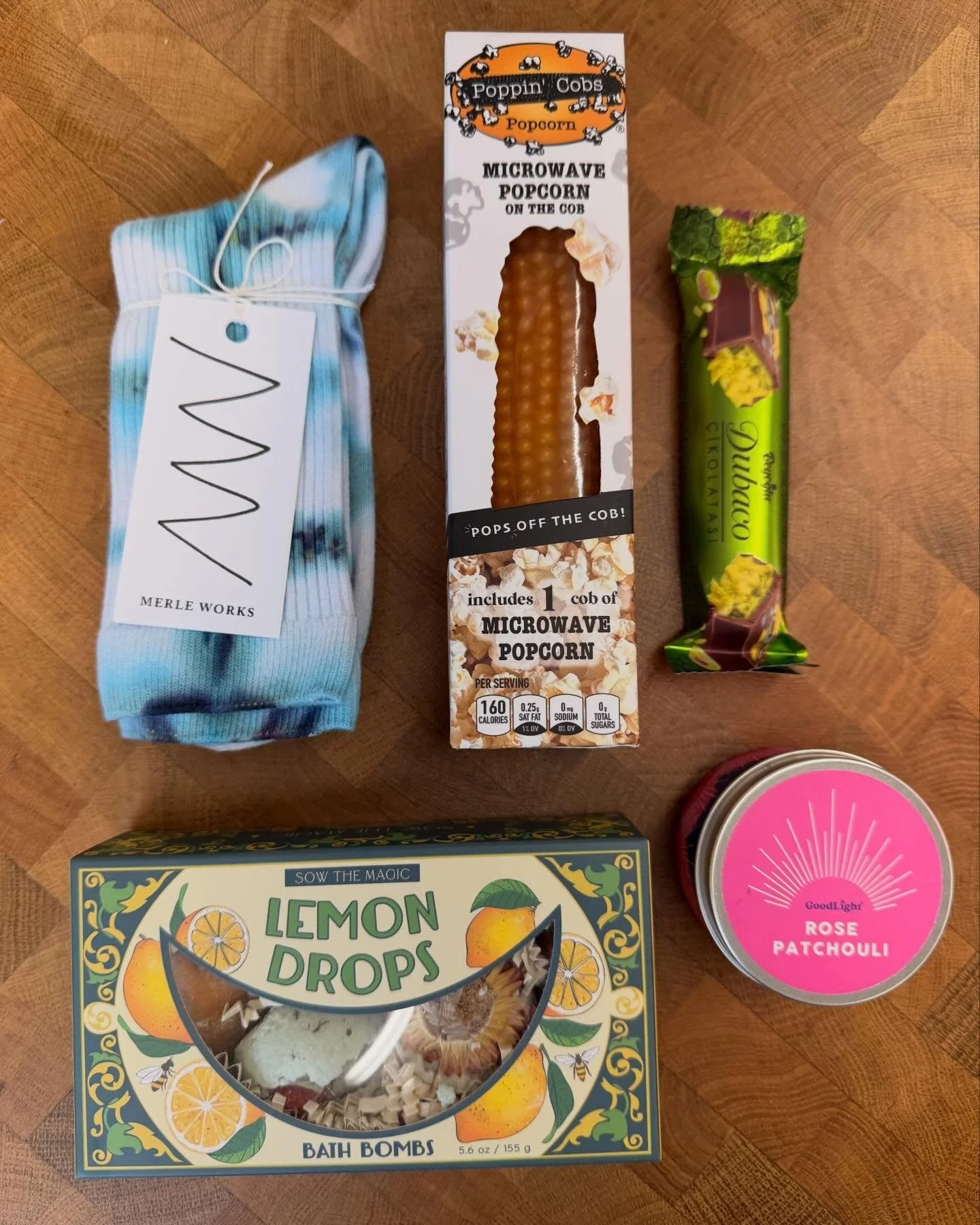 A perfect little collection of useful and consumable treats to bring a friend for their birthday or to show love and appreciation ❤️ 
1. A pair of hand dyed socks.
2. Fun microwaveable pop corn!
3. Dubai chocolate, because everyone should try it at l