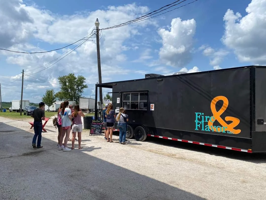 Customers Standing in Line at the Food Truck