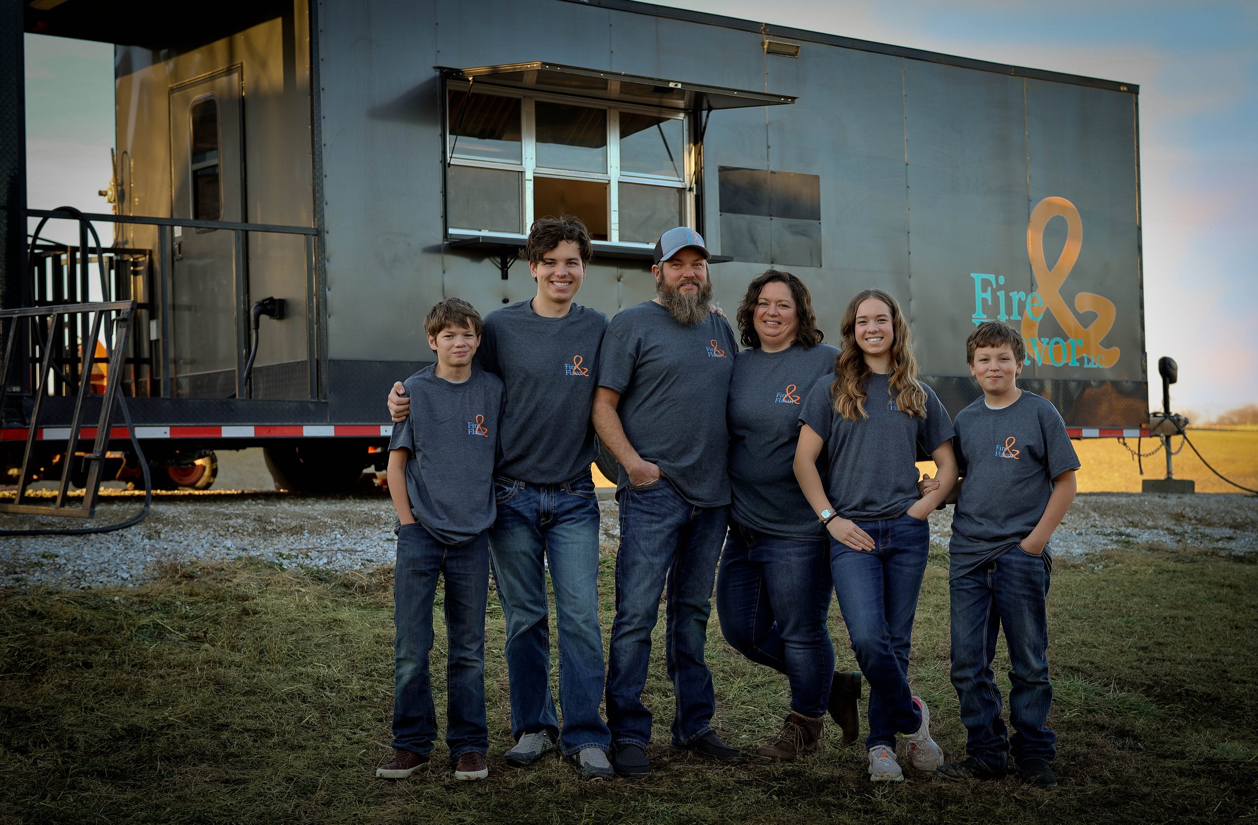 Family Photo in front of food trailer
