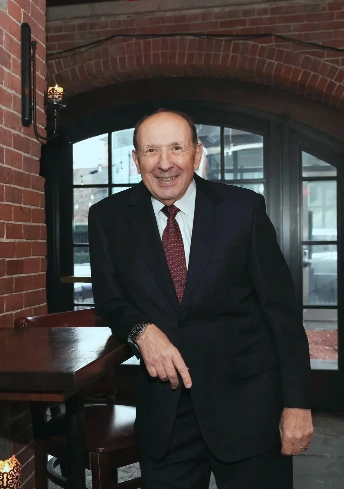 John Ranelli CEO and author in brick room.jpg