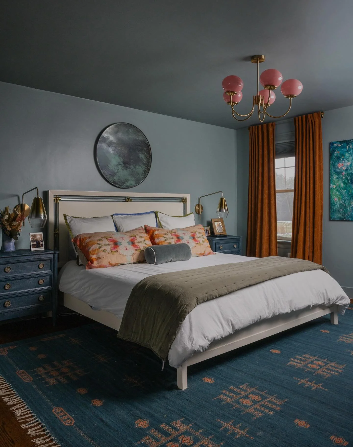 Our main floor is defined by openness and a cohesive palette. In more private spaces, like our primary bedroom, I lean into deeper, moodier tones that feel intimate and enveloping. After a cloudy weekend with a forecasted rainy week, it feels fitting