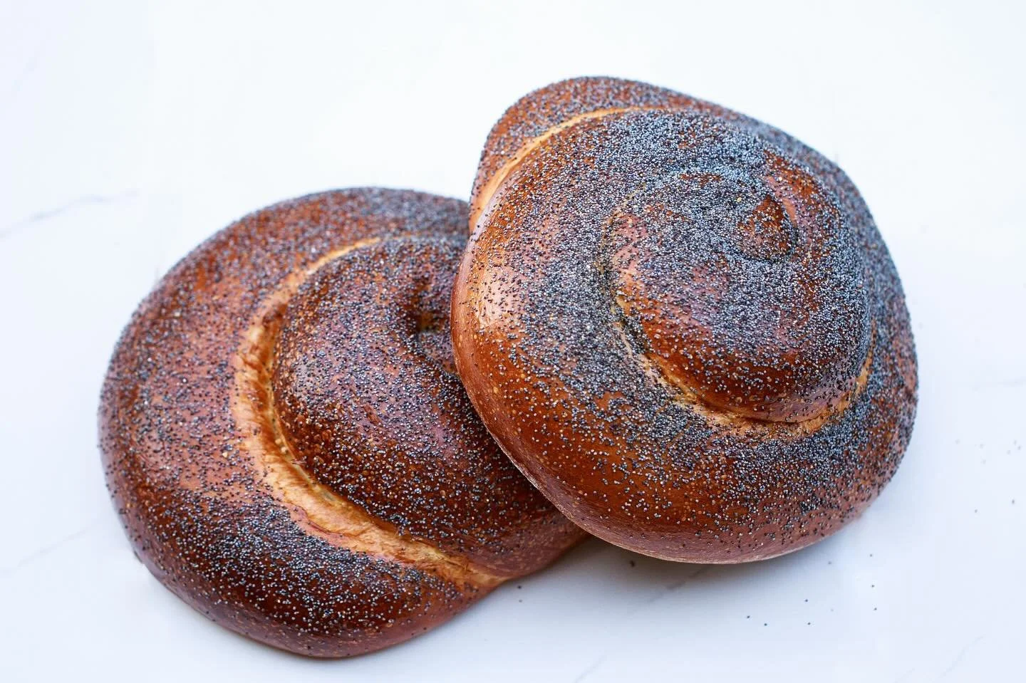 It’s that time the year again, the Jewish “birthday of the world” Rosh Hashanah! Our online store is open for you to make a pre-order to pick up a Round Challah (Plain, Poppyseed, or Raisin), a Chocolate Babka, and a Apple and Honey