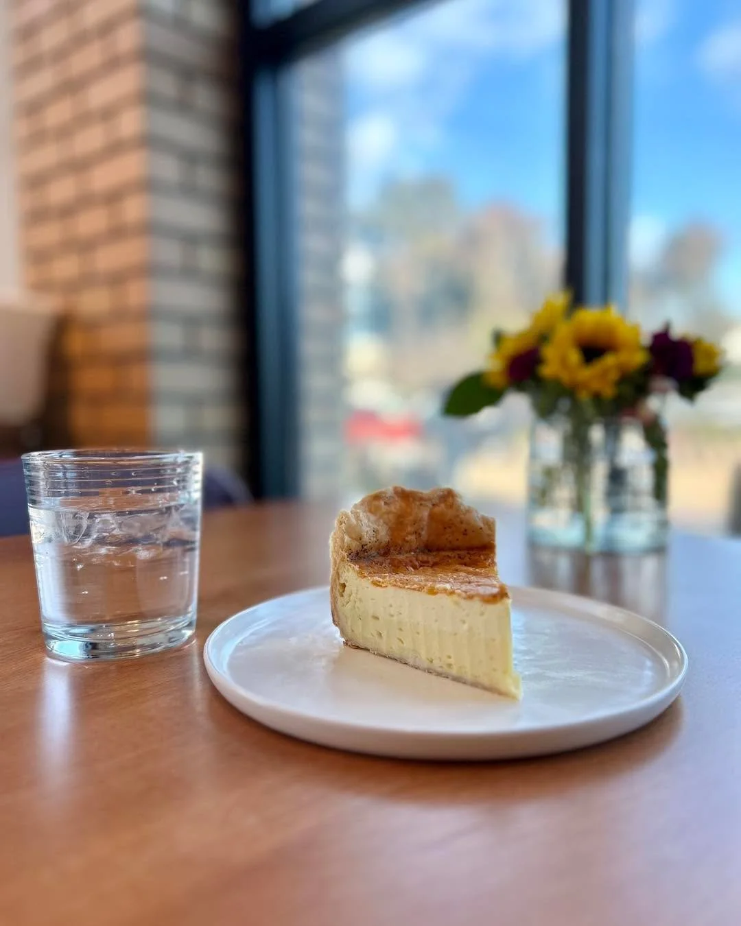 Have you tried a slice of our Quiche yet? It is wonderfully fluffy, almost souffle-like. We offer a classic Cheese Quiche, and a Quiche Lorraine with onions and ham. Take it cold to go, or sit and stay a while with a hot quiche that comes with a smal