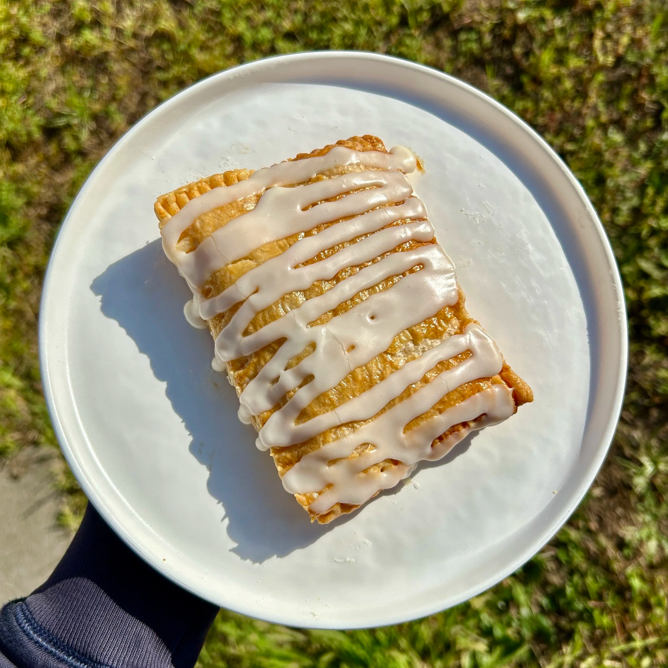 A sweet, fruity compote of best-of-season stone fruits rests between layers of our flaky pie dough. Finished with a vanilla icing.