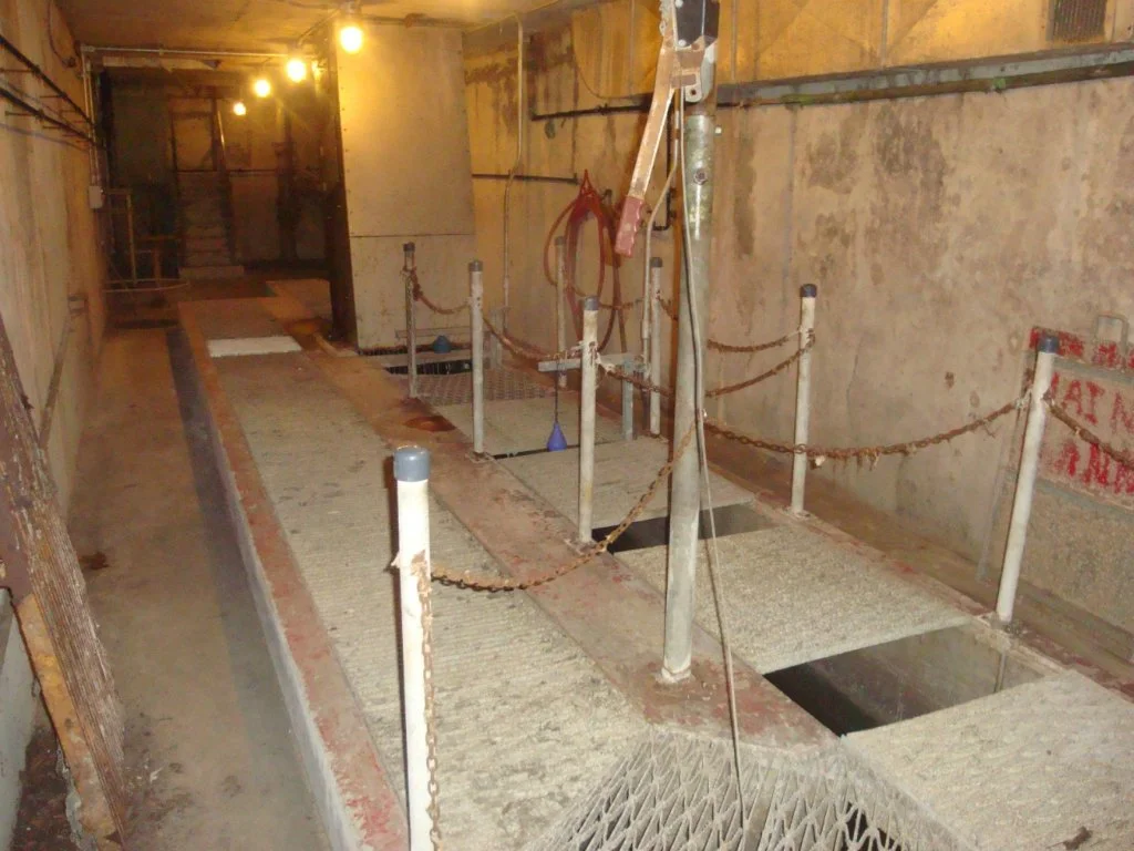 3. Screening (Wet Well):
Influent wastewater from the interceptor arrives at the WWTF via an influent channel upstream of the influent wet well.  The channel is outfitted with a mechanically cleaned screen.  This screen has a 1.5-inch clear space bet