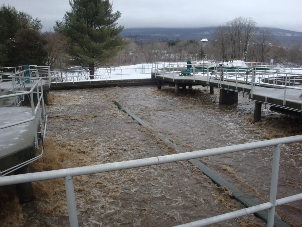 10. Aeration Tank:
Following primary clarification, primary effluent flows to the two aeration basins. The aeration basins are configured to operate in parallel.  Each aeration basin has a volume of approximately 717,000 gallons . Four, 30 horsepower