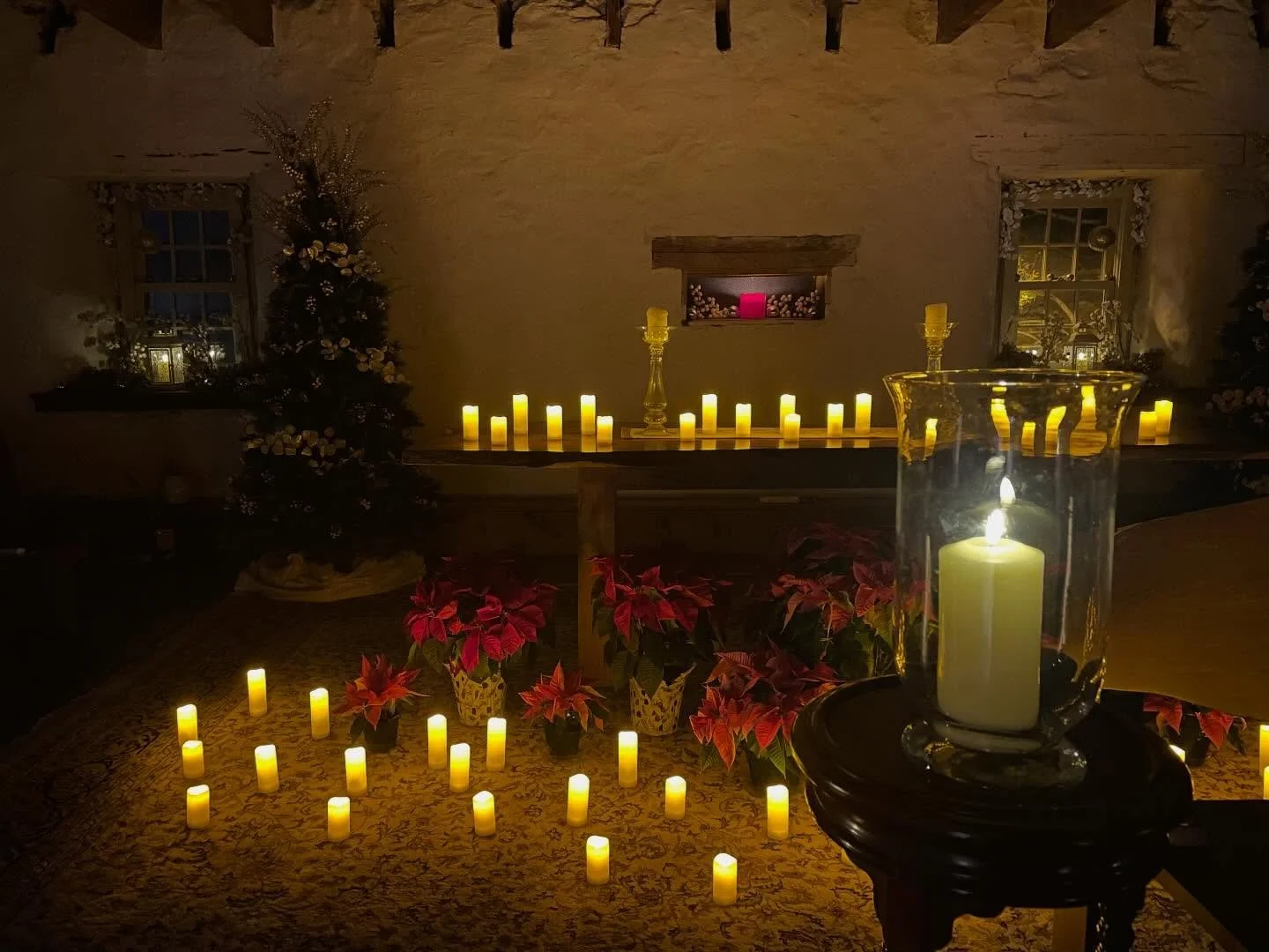 Upon entering the candlelit barn, a sense of warmth and comfort enveloped you. It was a spiritually thin place where those seeking a divine encounter found solace. The harp and singing bowls played classic Christmas hymns, evoking peace and profound 