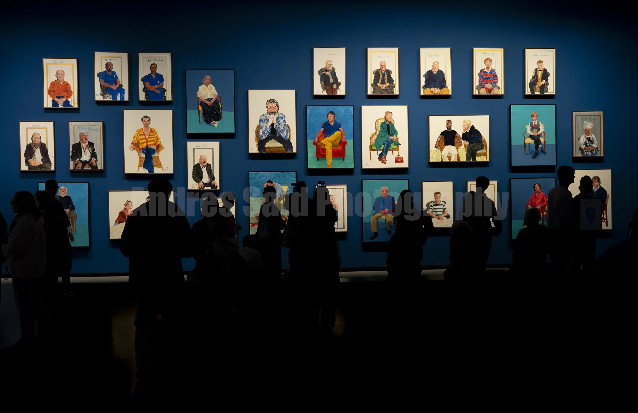 In this photo, I captured the portraits Hockney painted of his friends, family, and others. These were among my favorites,  the way they stand out against the blue background makes each painting feel almost like a photograph.
