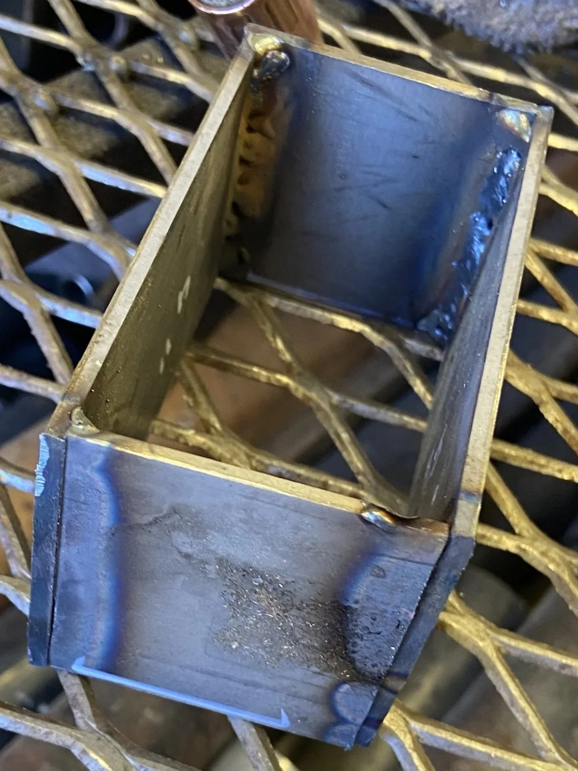 Here I welded some metal coupons together to make a compartment for my desk organizer. 